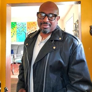 Slightly used black leather biker jacket